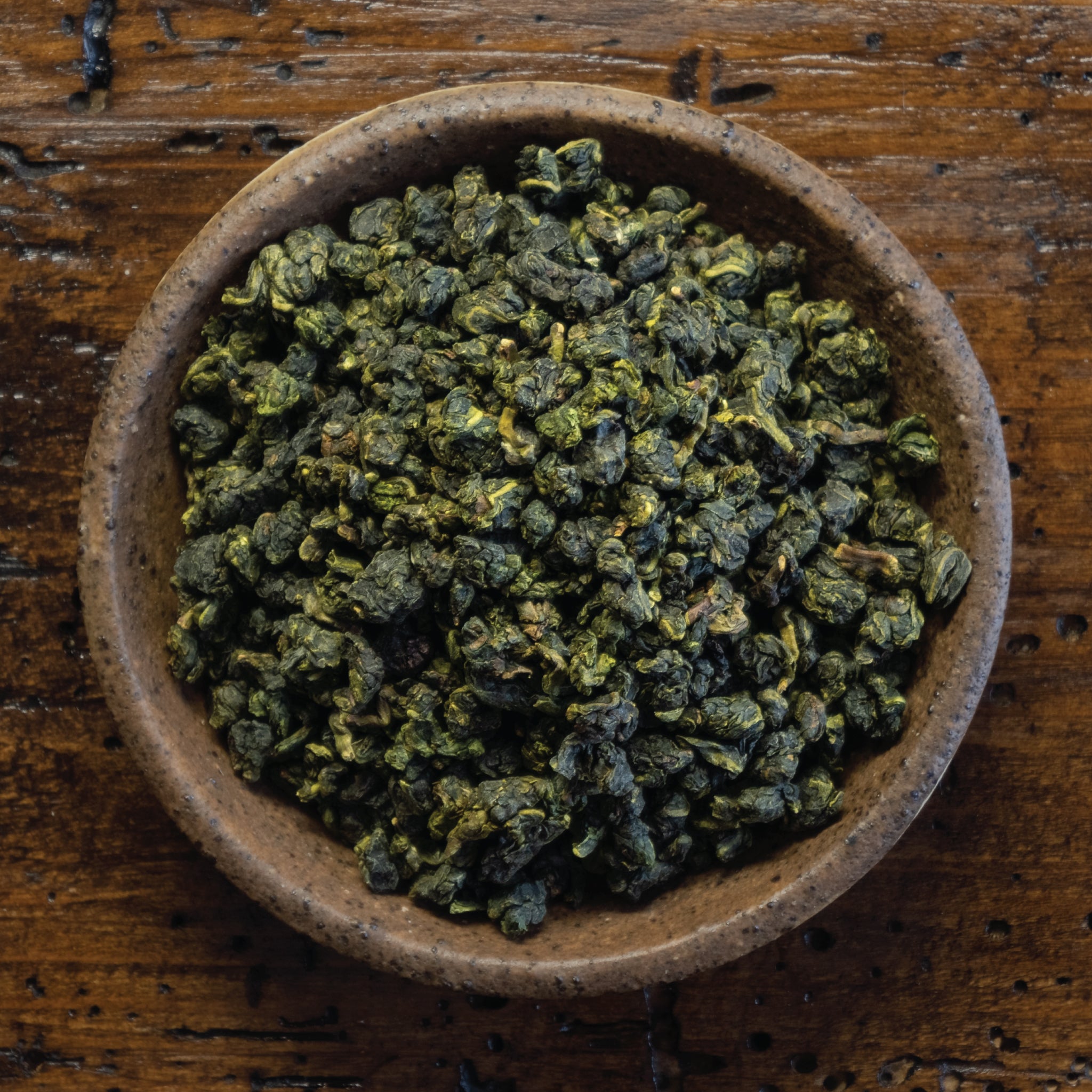 Té oolong: Exquisito té oolong, con un equilibrio único entre té verde y té negro, ofreciendo complejidad de sabores.